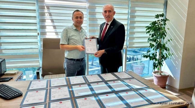 KESOB'un konut projesinde arsaların tapuları alındı