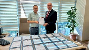 KESOB'un konut projesinde arsaların tapuları alındı